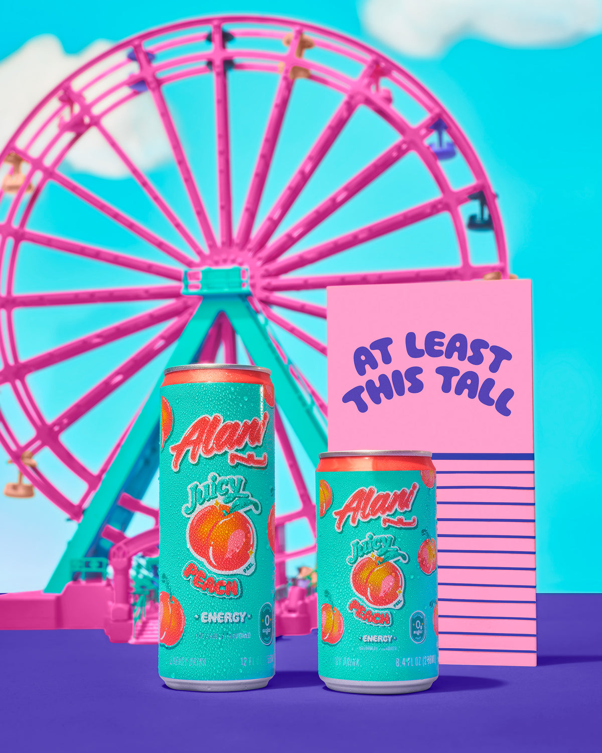 Mini Energy in Juicy Peach flavor next to a pink carousel fair ride. 