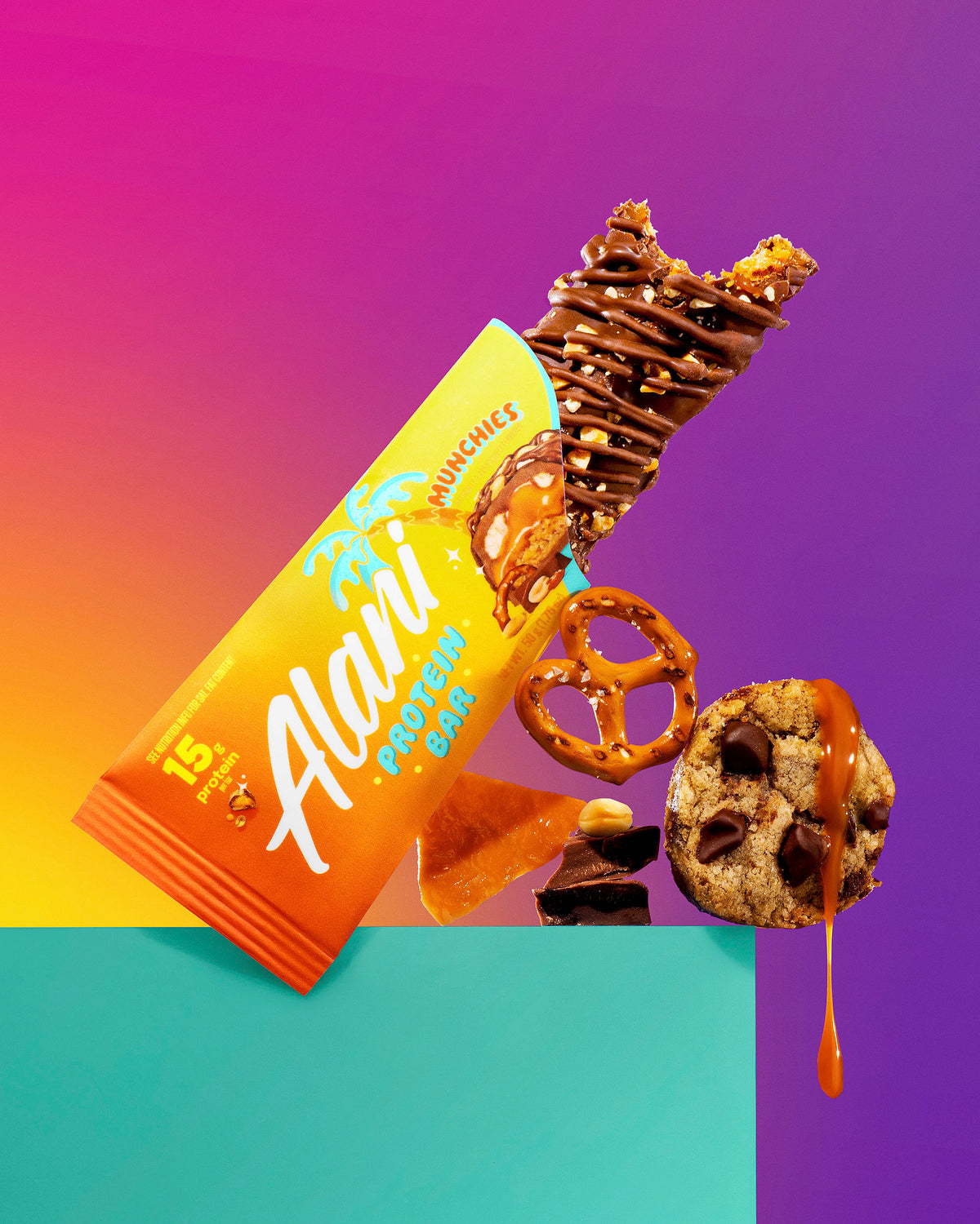 Protein bars in flavor munchies are displayed next to a cookie and pretzel.