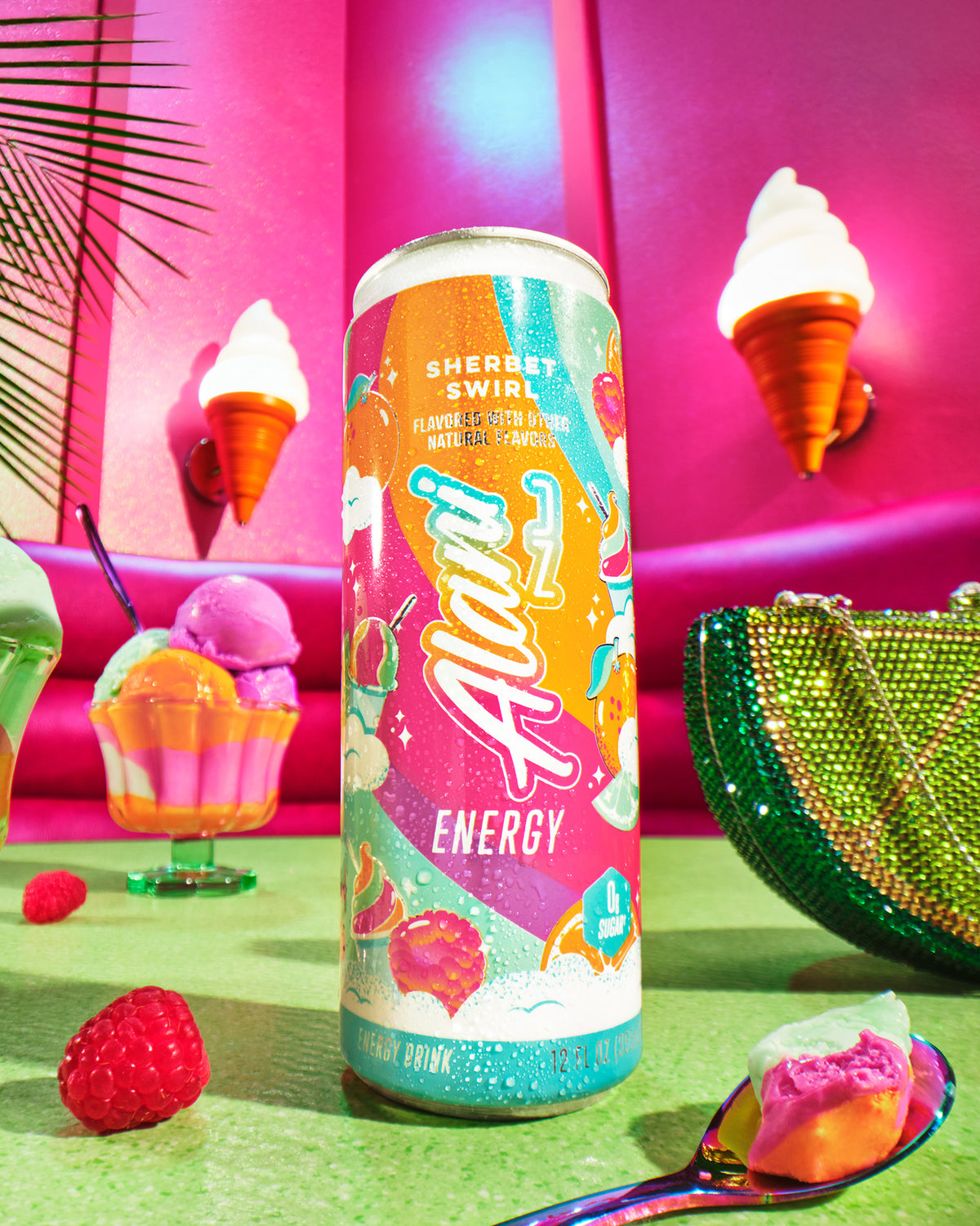 A sugar-free Sherbet Swirl Energy Drink served at a retro sherbet shoppe booth alongside raspberries, a lime-shaped purse, and a sherbet sundae.