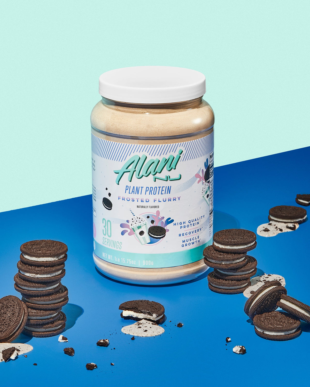 Plant Protein in Frosted Flurry flavor surrounded by cookies.