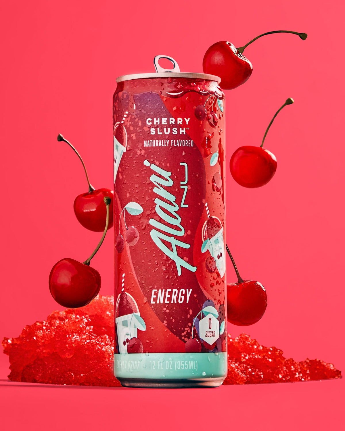 An Energy Drink in Cherry Slush flavor next to cherry's.