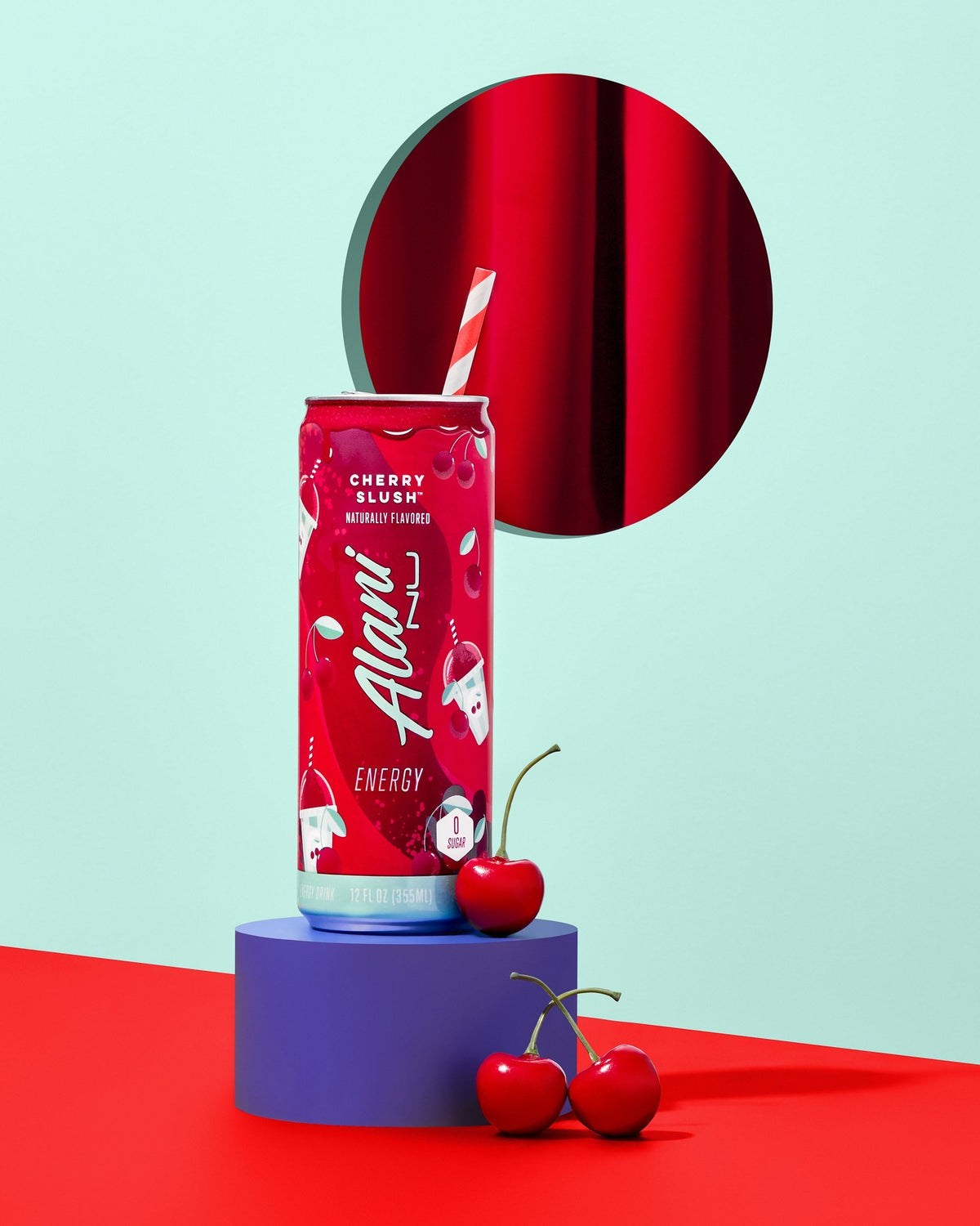 Energy Drink in Cherry Slush flavor next to a cherry's.