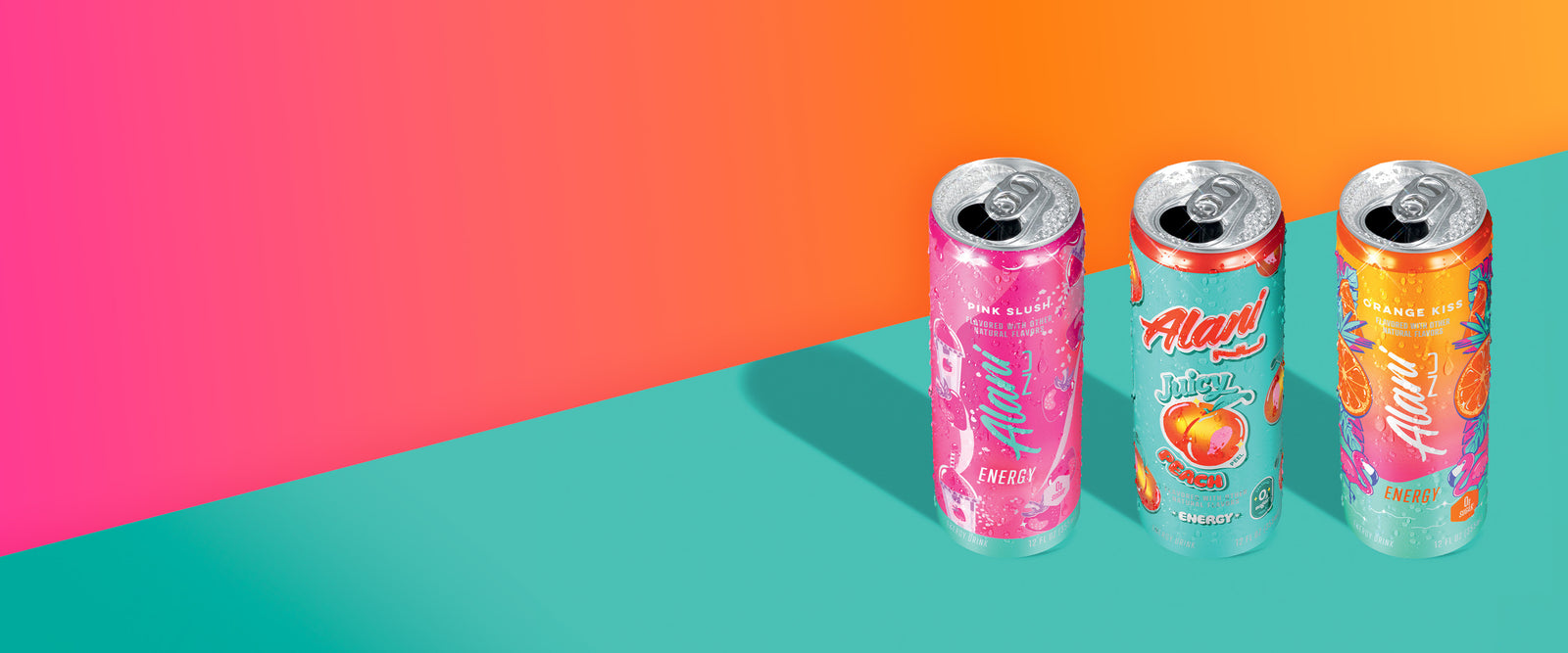 Sugar-free Pink Slush, Juicy Peach, and Orange Kiss Alani Nu Energy Drinks sitting lined up on a ledge