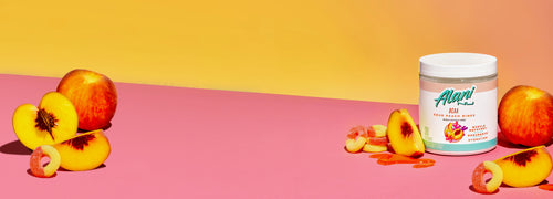 Alani Nu BCAA - Sour Peach Rings with a side of sliced peaches on the side. 