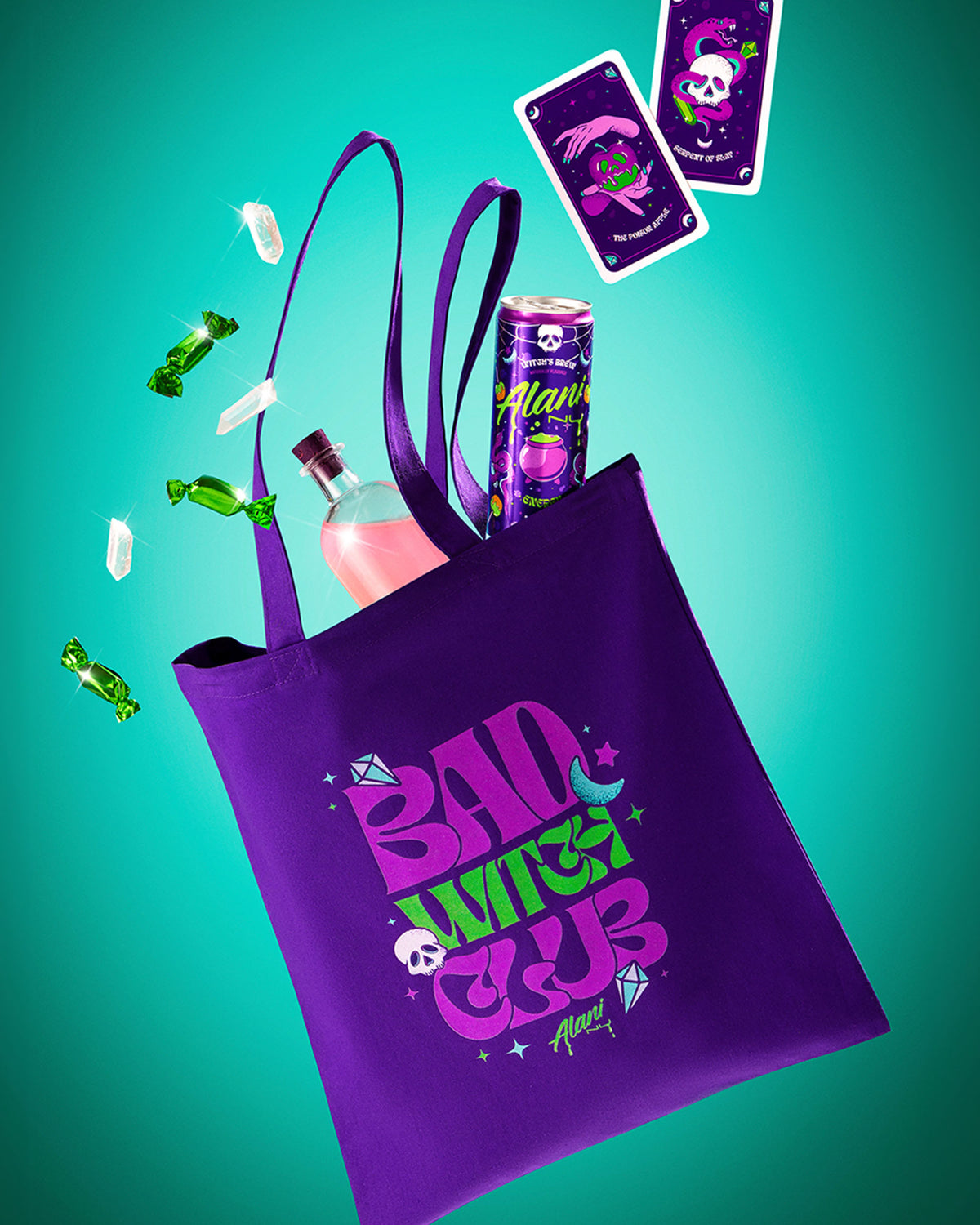 Witch&#39;s Brew tote bag showcasing a bag full of Witch&#39;s Brew energy drinks, playing cards and candy inside bag. 
