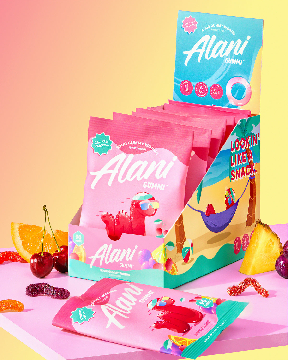 A cartoon of Alani Nu Sour Gummy Worms snacks sitting on top of a table.
