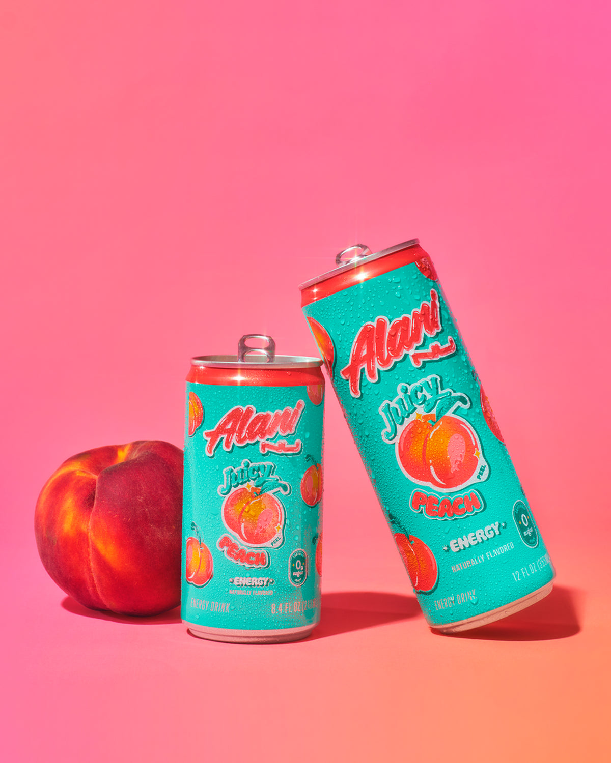 A Peach next to Mini Energy and regular size Energy Drink in Juicy Peach flavor.
