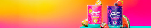 Alani Nu's thermogenic Pre-Workout+ Burn in Dragon Fruit Rush flavor and Melonberry Blast flavor shown on a pedestal with tropical fruits.
