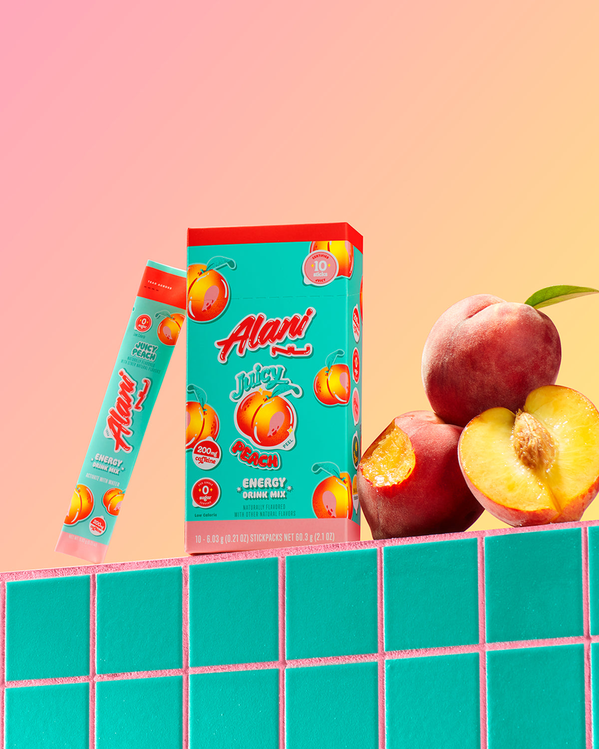 Energy Sticks in Juicy Peach displayed next to Peaches.