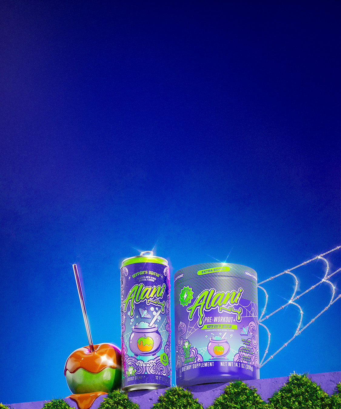 A caramel apple leaning on Alani Nu's fall Witch's Brew Energy Drink and Pre-Workout+ atop a mossy garden wall. Bejeweled cobwebs fill the frame.
