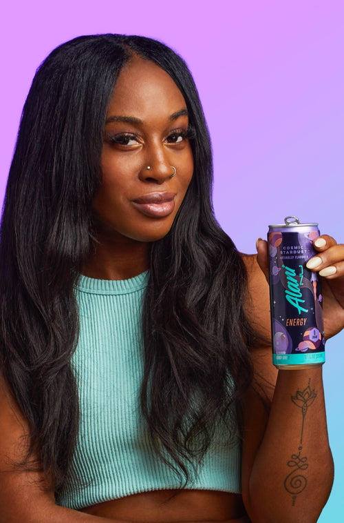A women holding a can of Cosmic Stardust - Energy Drink.