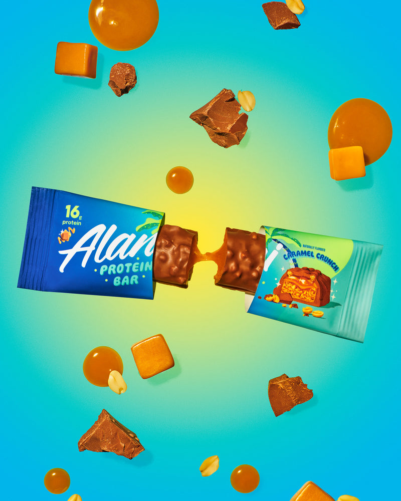 A Protein Bar in Caramel Crunch flavor split in half.