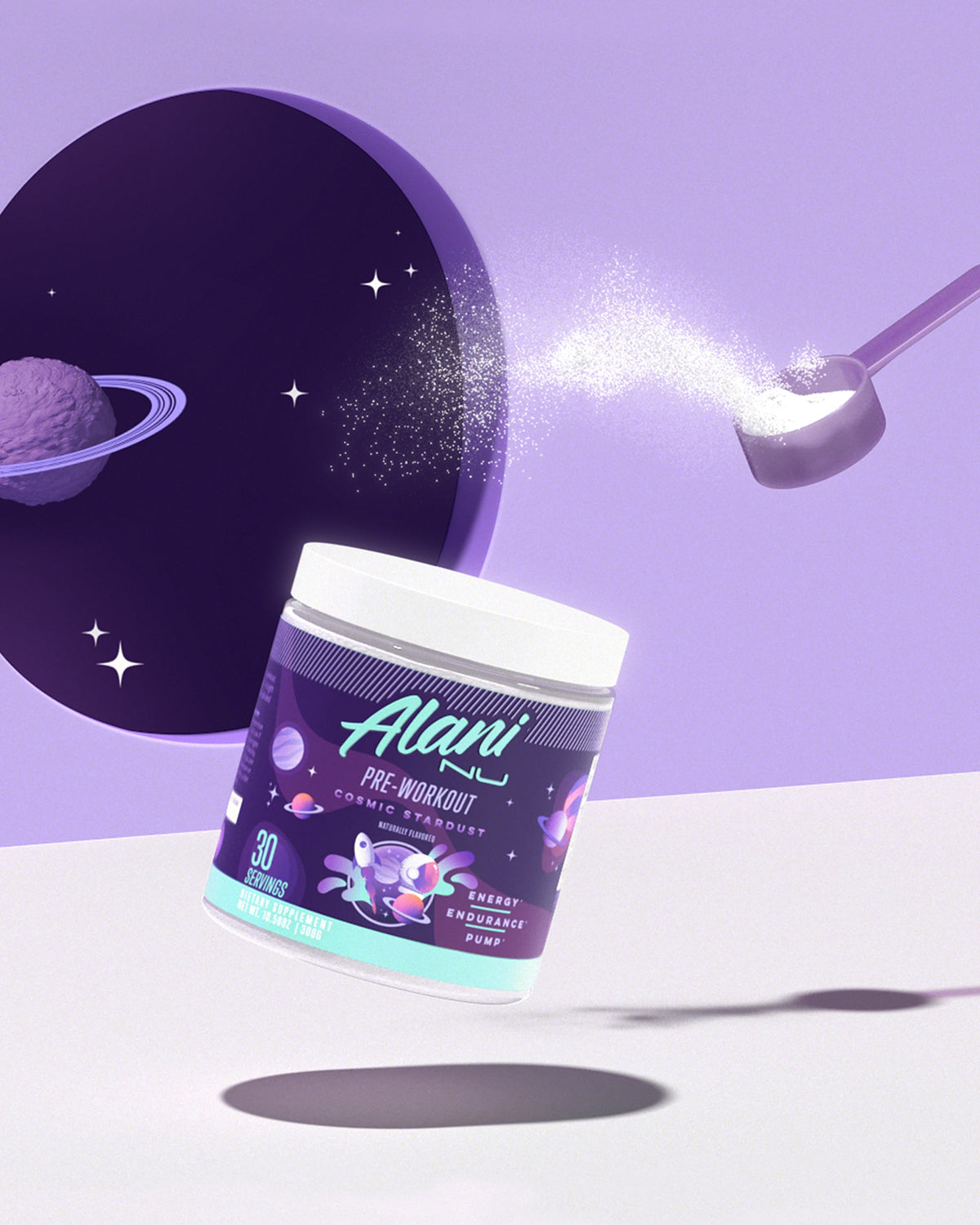 A container  of Alani Nu Cosmic Stardust Pre-Workout and a spoon on a table.
