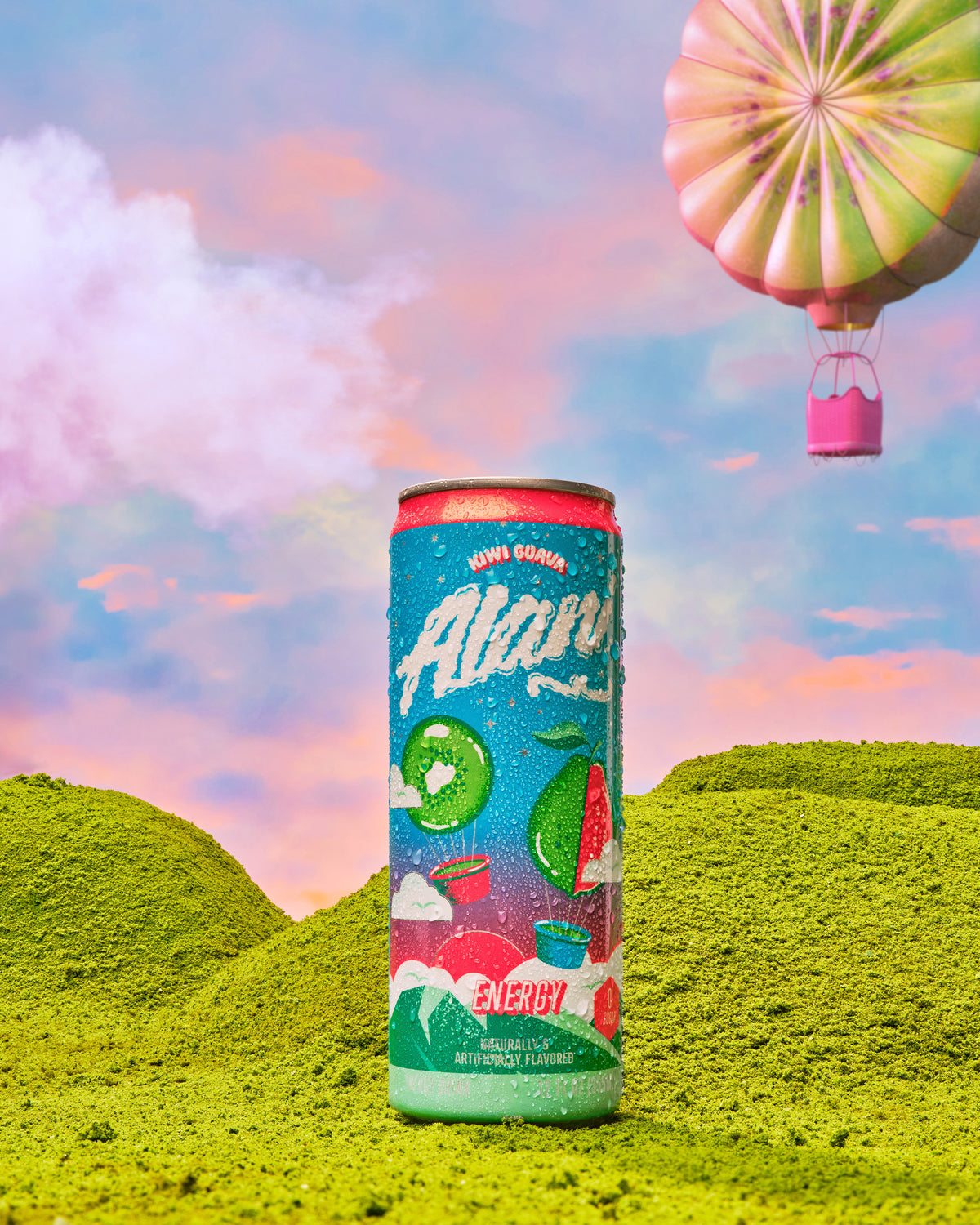 An Energy Drink in Kiwi Guava flavor can sitting on top of a lush green field.