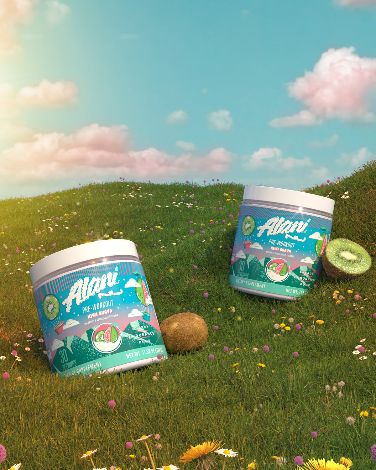 Two Alani Nu Pre-Workout - Kiwi Guava containers sitting on top of a lush green field.